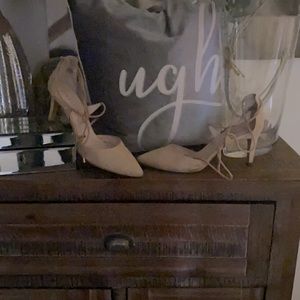 Beautiful Beige heels with wrap around strap.
